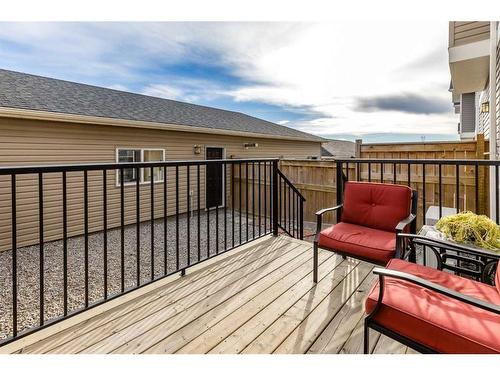 13 Willow Green Way, Cochrane, AB - Outdoor With Deck Patio Veranda With Exterior