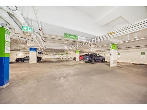 313-8445 Broadcast Avenue Sw, Calgary, AB - Indoor Photo Showing Garage