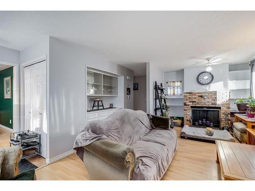 11 Whitewood Bay Ne, Calgary, AB - Indoor Photo Showing Living Room With Fireplace