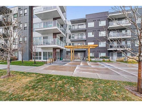 115-4150 Seton Drive, Calgary, AB - Outdoor With Balcony With Facade