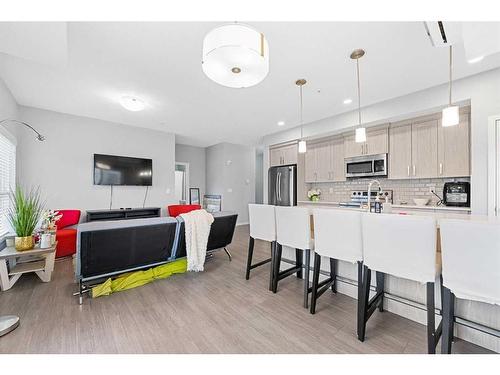 115-4150 Seton Drive, Calgary, AB - Indoor Photo Showing Kitchen