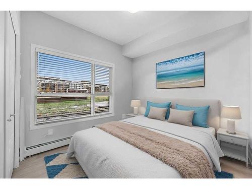 115-4150 Seton Drive, Calgary, AB - Indoor Photo Showing Bedroom