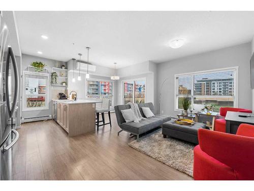 115-4150 Seton Drive, Calgary, AB - Indoor Photo Showing Living Room