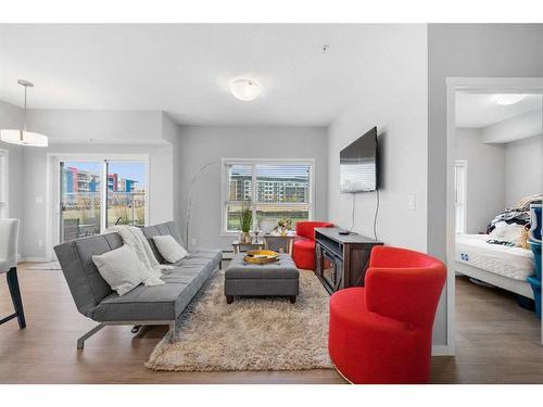 115-4150 Seton Drive, Calgary, AB - Indoor Photo Showing Living Room