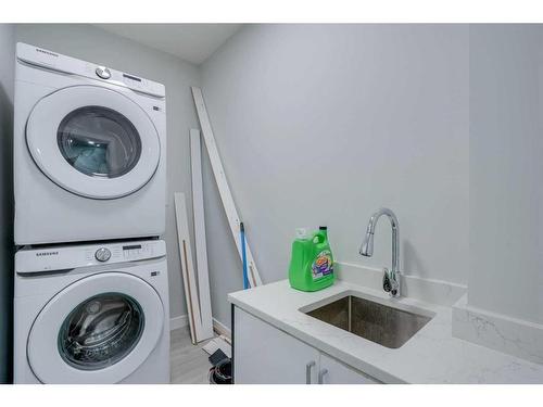 673 Corner Meadows Way Ne, Calgary, AB - Indoor Photo Showing Laundry Room