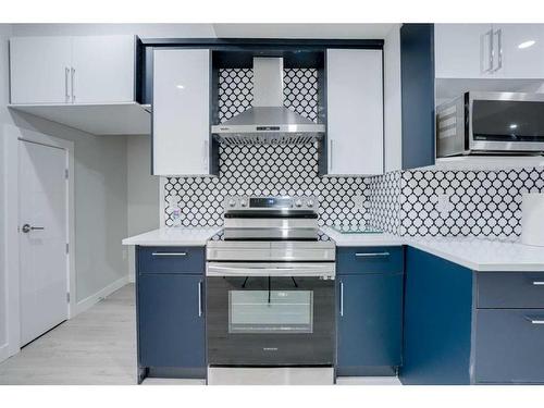 673 Corner Meadows Way Ne, Calgary, AB - Indoor Photo Showing Kitchen With Double Sink