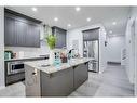 673 Corner Meadows Way Ne, Calgary, AB  - Indoor Photo Showing Kitchen With Stainless Steel Kitchen With Upgraded Kitchen 