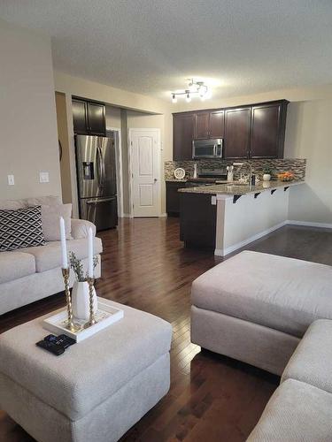 1817 Baywater Gardens Sw, Airdrie, AB - Indoor Photo Showing Living Room