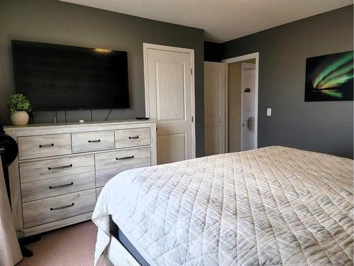 1817 Baywater Gardens Sw, Airdrie, AB - Indoor Photo Showing Bedroom