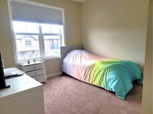 1817 Baywater Gardens Sw, Airdrie, AB - Indoor Photo Showing Bedroom