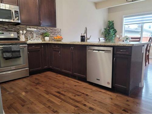 1817 Baywater Gardens Sw, Airdrie, AB - Indoor Photo Showing Kitchen