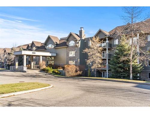 3128-3000 Millrise Point Sw, Calgary, AB - Outdoor With Balcony With Facade