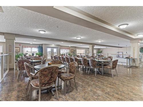 3128-3000 Millrise Point Sw, Calgary, AB - Indoor Photo Showing Dining Room