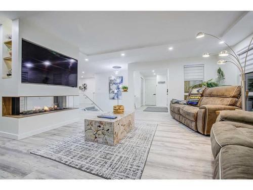 2016 Lake Bonavista Drive Se, Calgary, AB - Indoor Photo Showing Living Room