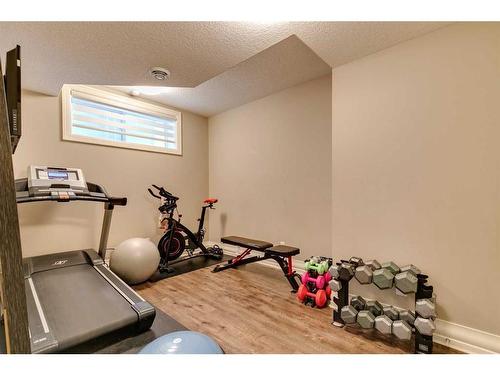 79 West Grove Rise Sw, Calgary, AB - Indoor Photo Showing Gym Room