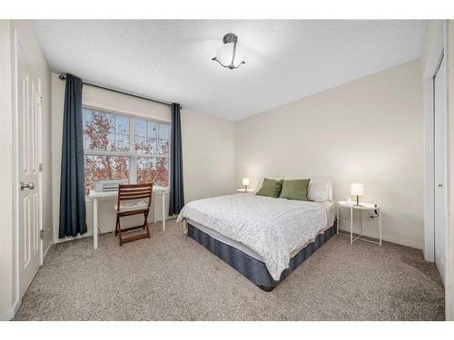 63 Cramond Green Se, Calgary, AB - Indoor Photo Showing Bedroom