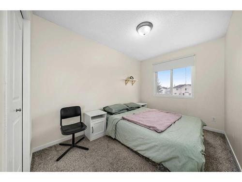 63 Cramond Green Se, Calgary, AB - Indoor Photo Showing Bedroom