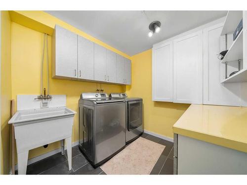 63 Cramond Green Se, Calgary, AB - Indoor Photo Showing Laundry Room