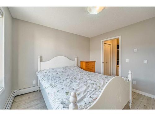 220-7 Westpark Common Sw, Calgary, AB - Indoor Photo Showing Bedroom