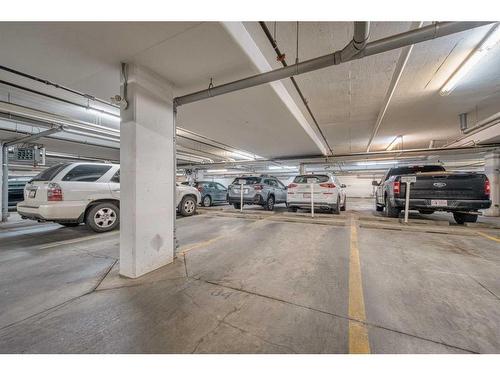 220-7 Westpark Common Sw, Calgary, AB - Indoor Photo Showing Garage