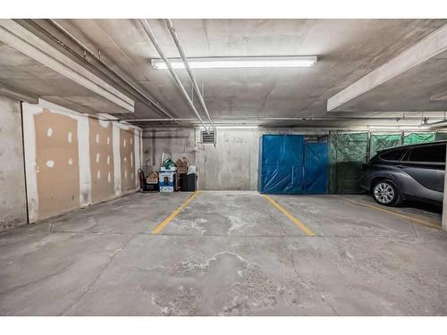 103-6550 Old Banff Coach Road Sw, Calgary, AB - Indoor Photo Showing Garage