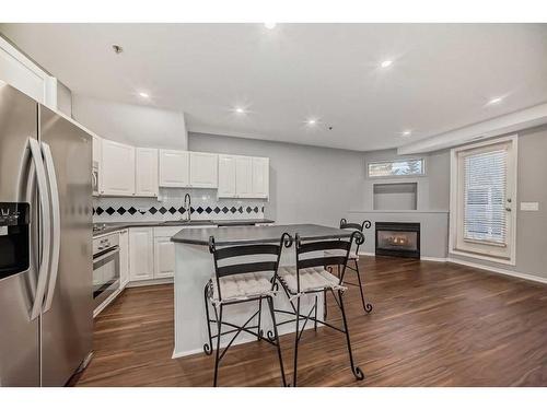 103-6550 Old Banff Coach Road Sw, Calgary, AB - Indoor Photo Showing Kitchen With Stainless Steel Kitchen