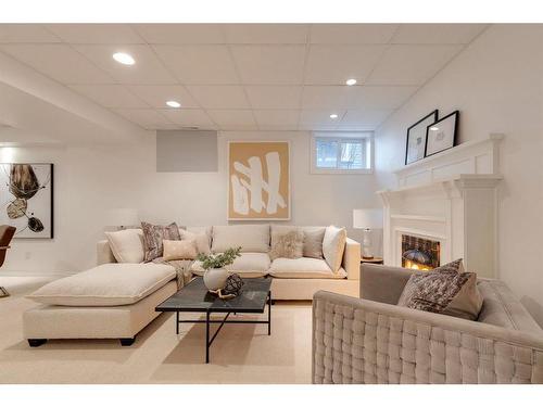 524 Crescent Road Nw, Calgary, AB - Indoor Photo Showing Living Room With Fireplace