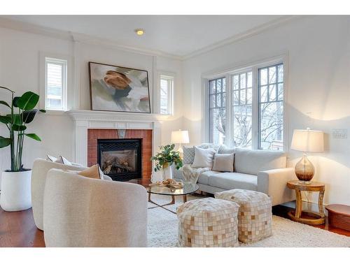 524 Crescent Road Nw, Calgary, AB - Indoor Photo Showing Living Room With Fireplace