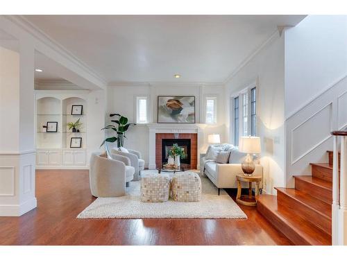 524 Crescent Road Nw, Calgary, AB - Indoor Photo Showing Living Room With Fireplace