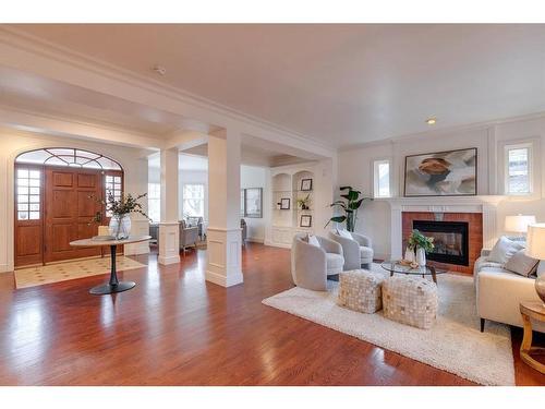 524 Crescent Road Nw, Calgary, AB - Indoor Photo Showing Living Room With Fireplace