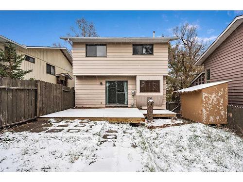 11 Coach Manor Rise Sw, Calgary, AB - Outdoor With Deck Patio Veranda With Exterior