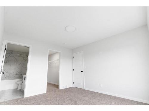 153 Dawson Circle, Chestermere, AB - Indoor Photo Showing Other Room