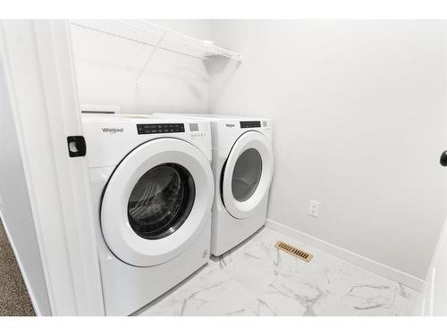 153 Dawson Circle, Chestermere, AB - Indoor Photo Showing Laundry Room