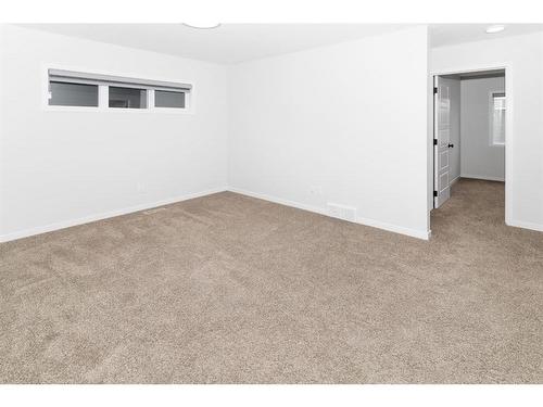 153 Dawson Circle, Chestermere, AB - Indoor Photo Showing Other Room