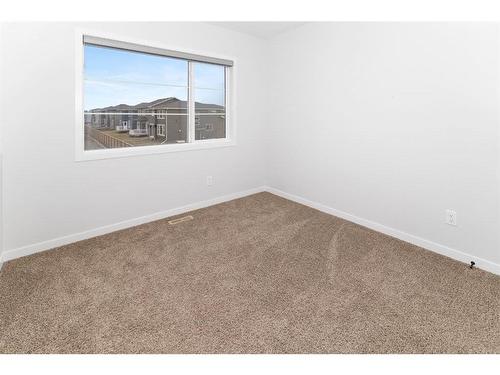 153 Dawson Circle, Chestermere, AB - Indoor Photo Showing Other Room