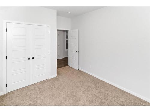 153 Dawson Circle, Chestermere, AB - Indoor Photo Showing Other Room