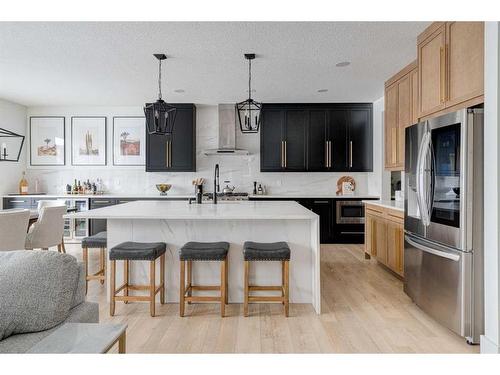 42 Westmore Park Sw, Calgary, AB - Indoor Photo Showing Kitchen With Stainless Steel Kitchen With Upgraded Kitchen