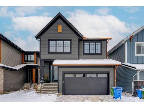 42 Westmore Park Sw, Calgary, AB - Outdoor With Facade