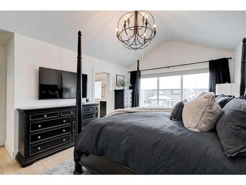 42 Westmore Park Sw, Calgary, AB - Indoor Photo Showing Bedroom