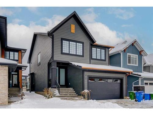 42 Westmore Park Sw, Calgary, AB - Outdoor With Facade