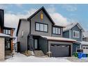 42 Westmore Park Sw, Calgary, AB  - Outdoor With Facade 