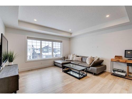 42 Westmore Park Sw, Calgary, AB - Indoor Photo Showing Living Room