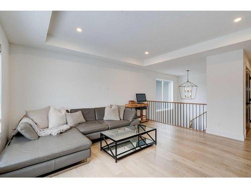 42 Westmore Park Sw, Calgary, AB - Indoor Photo Showing Living Room