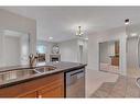 129-52 Cranfield Link Se, Calgary, AB  - Indoor Photo Showing Kitchen With Double Sink 