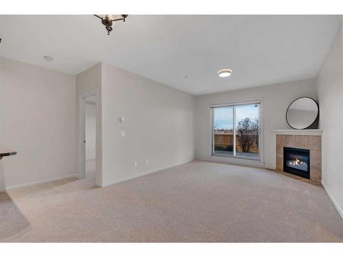 129-52 Cranfield Link Se, Calgary, AB - Indoor With Fireplace