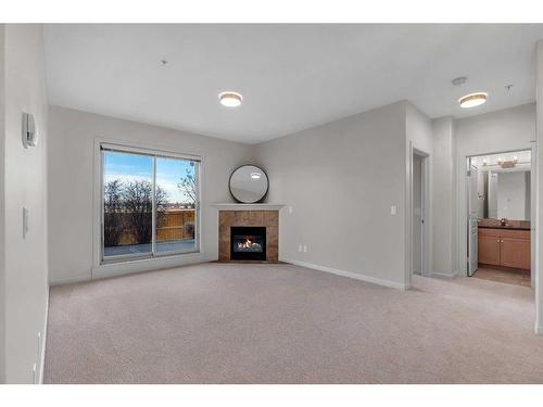 129-52 Cranfield Link Se, Calgary, AB - Indoor With Fireplace