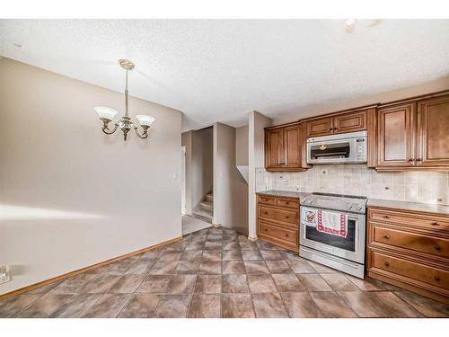 6112 Thornaby Way Nw, Calgary, AB - Indoor Photo Showing Kitchen