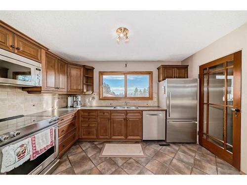 6112 Thornaby Way Nw, Calgary, AB - Indoor Photo Showing Kitchen With Stainless Steel Kitchen With Double Sink