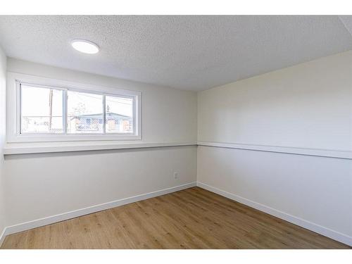 1-1709 48 Street Se, Calgary, AB - Indoor Photo Showing Other Room