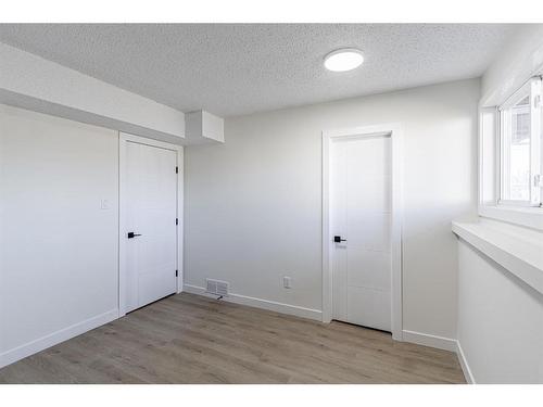 1-1709 48 Street Se, Calgary, AB - Indoor Photo Showing Other Room